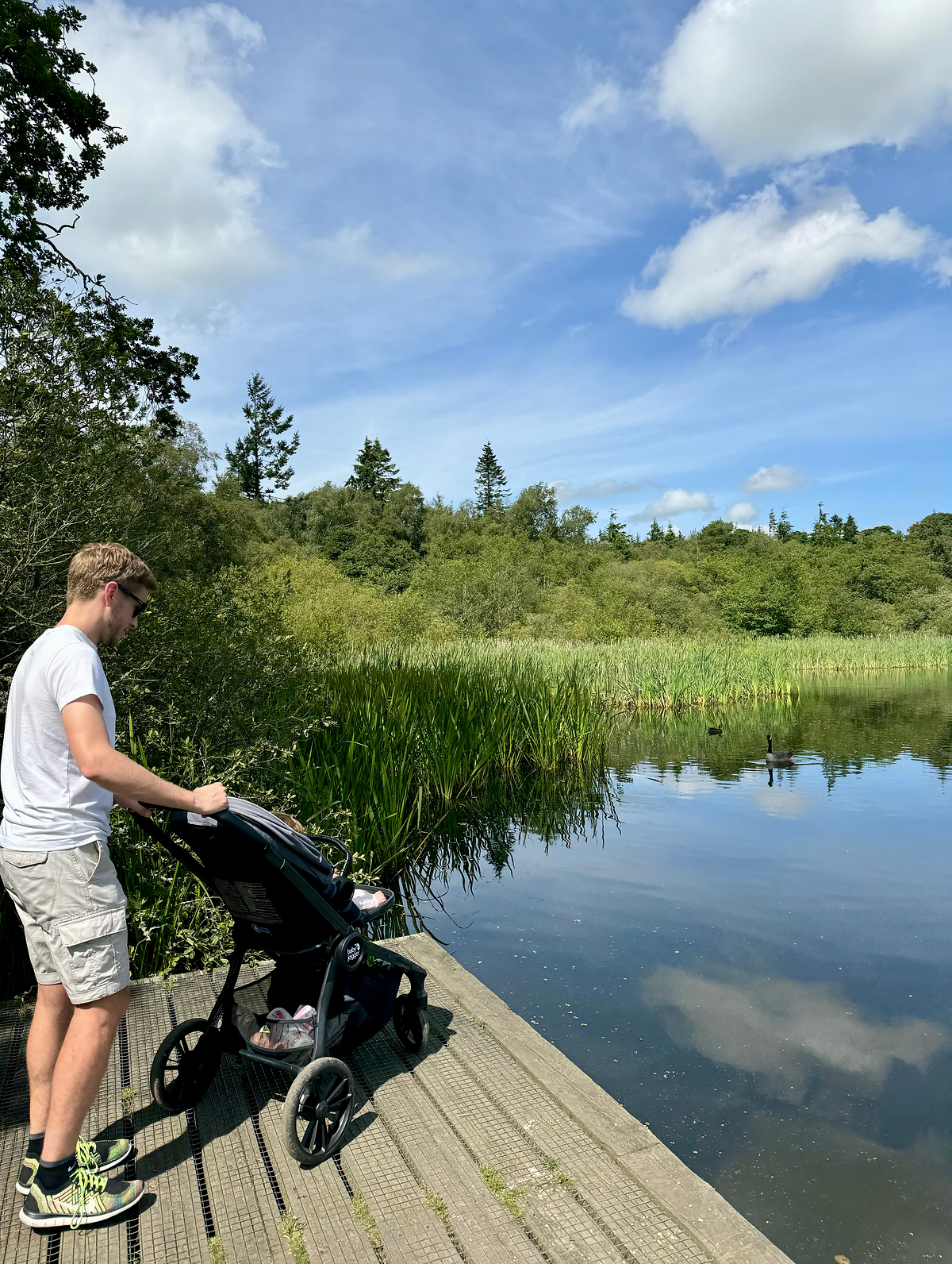 3 PRAM-FRIENDLY WALKS IN NORTHUMBERLAND bolam lake man with pram