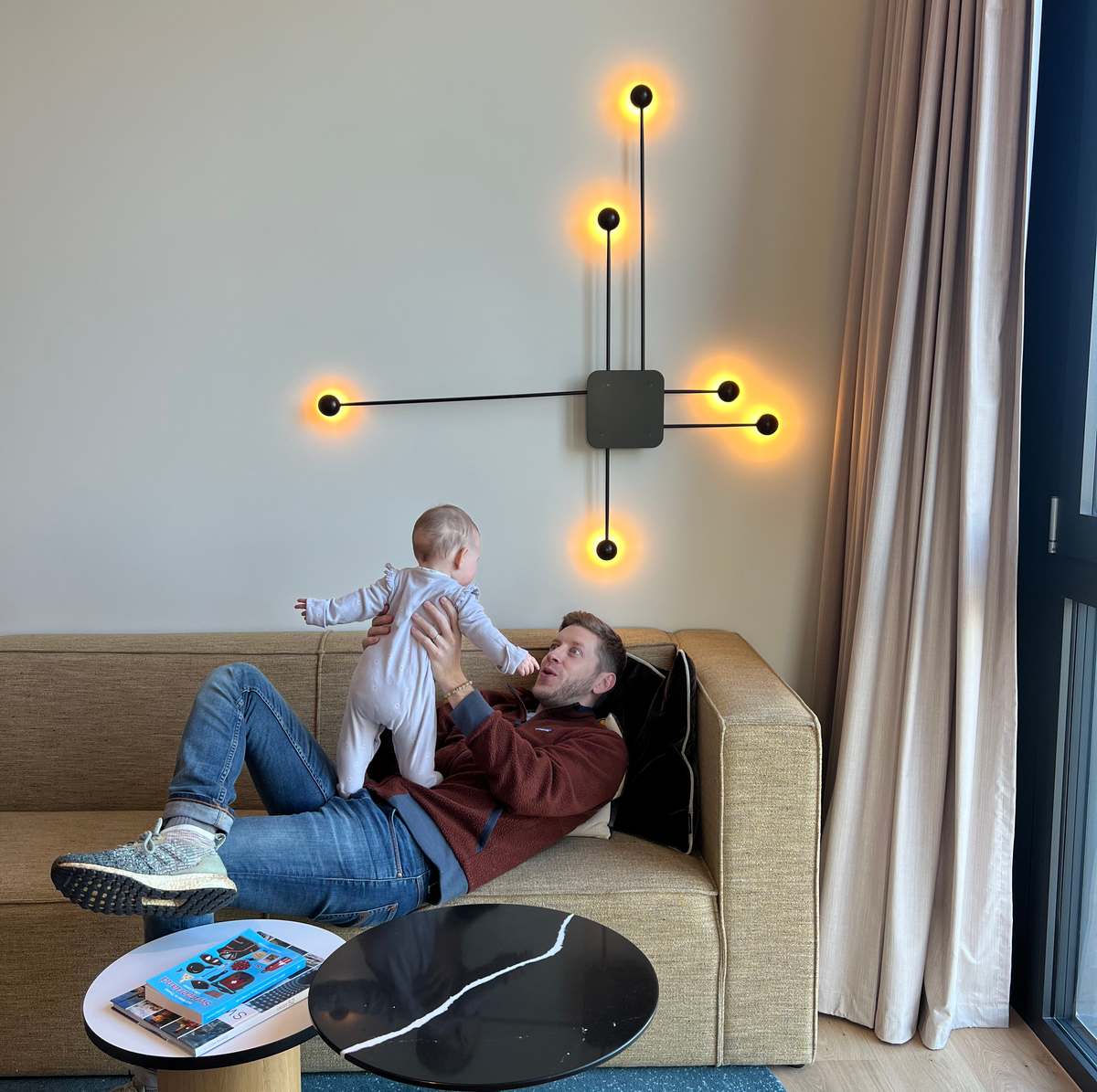 Man and baby in hotel