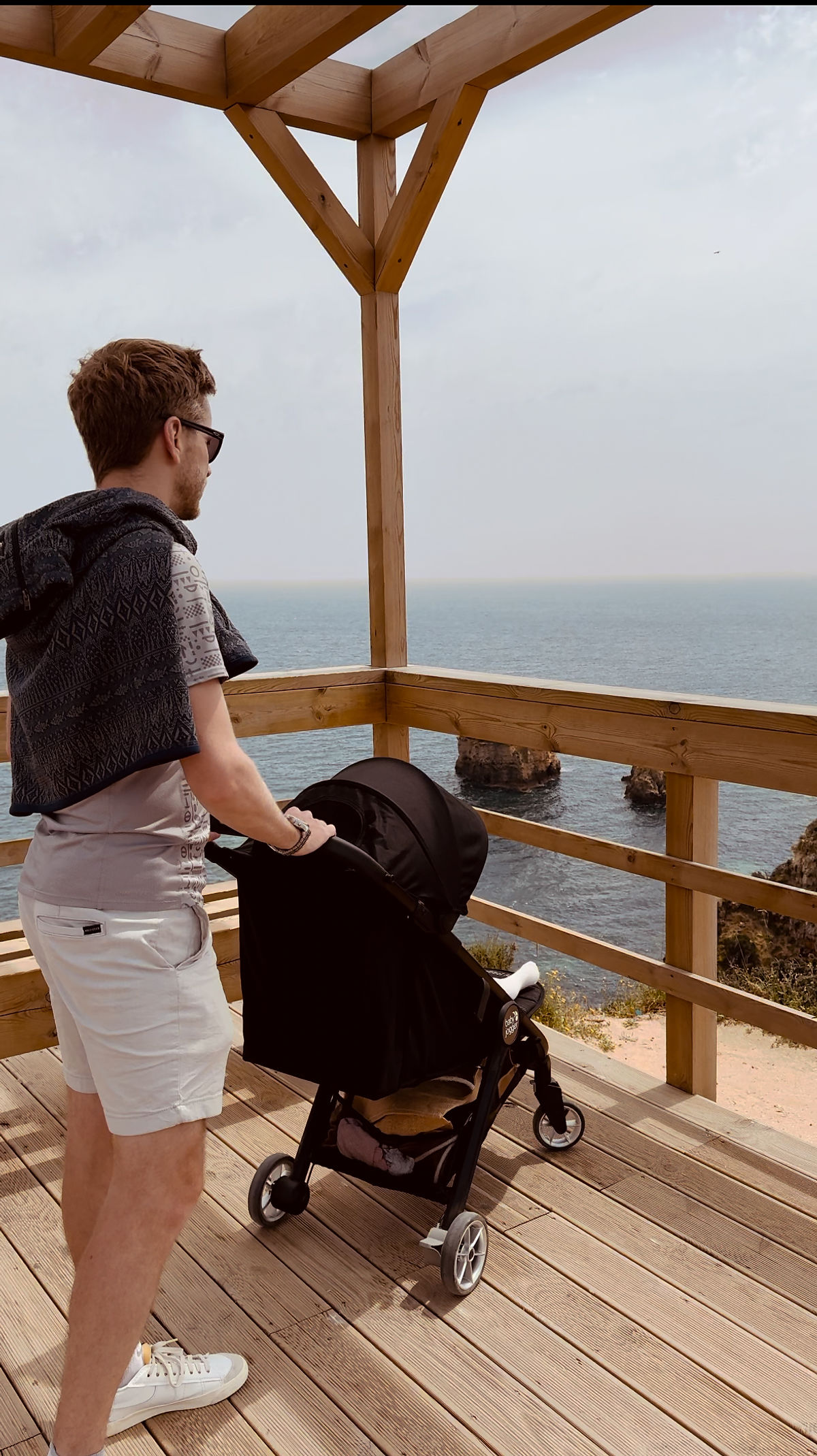 Man with baby in pram