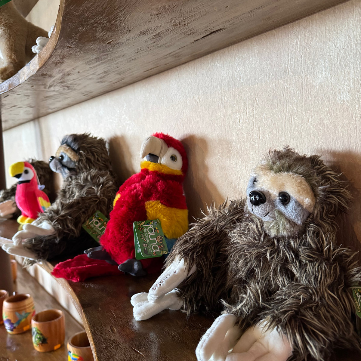 Sloth and parrot toys