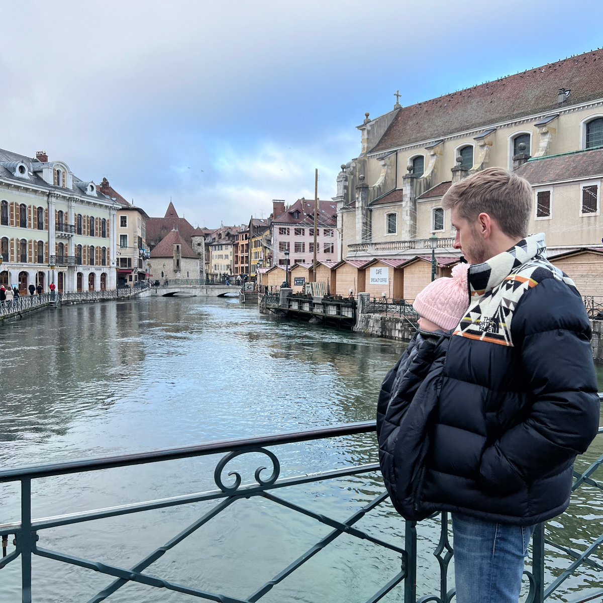 GENEVA CHRISTMAS MARKET ITINERARY Man with baby in carrier Annecy