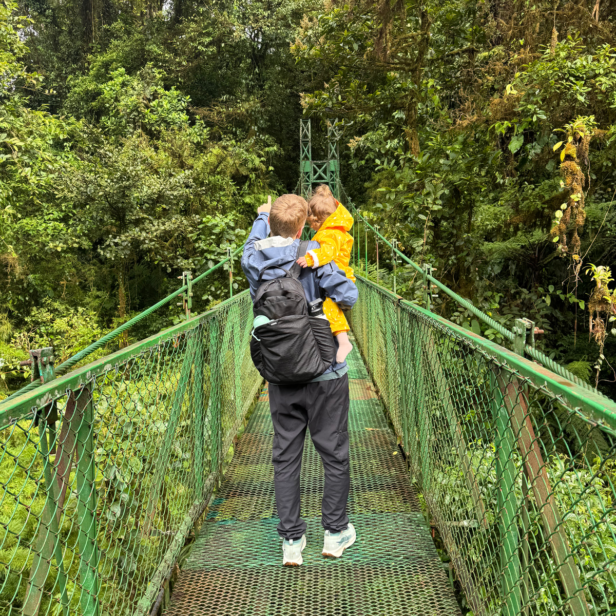BEST THINGS TO DO IN MONTEVERDE Dad carrying daughter