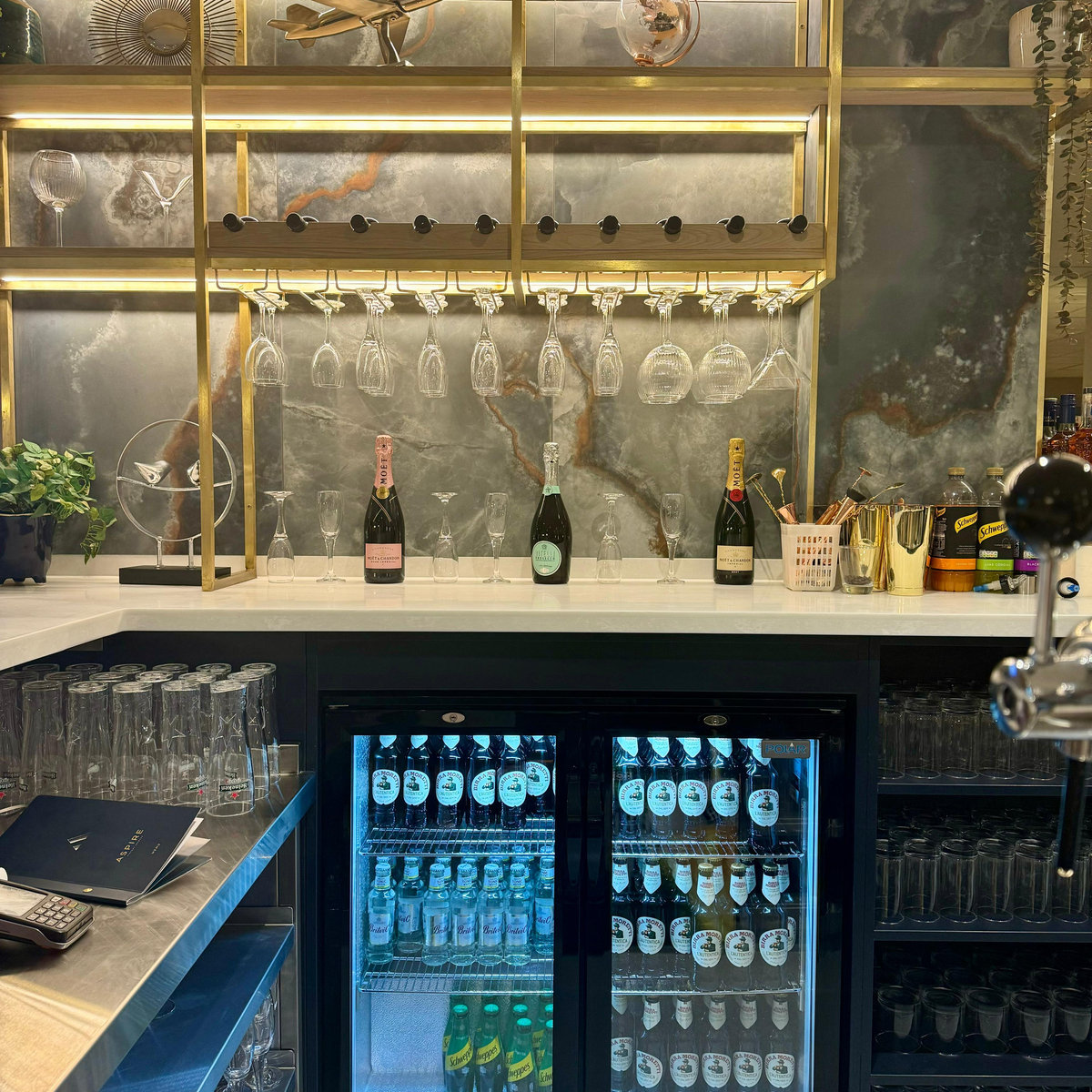 NEW NEWCASTLE AIRPORT LOUNGE Bar and fridge