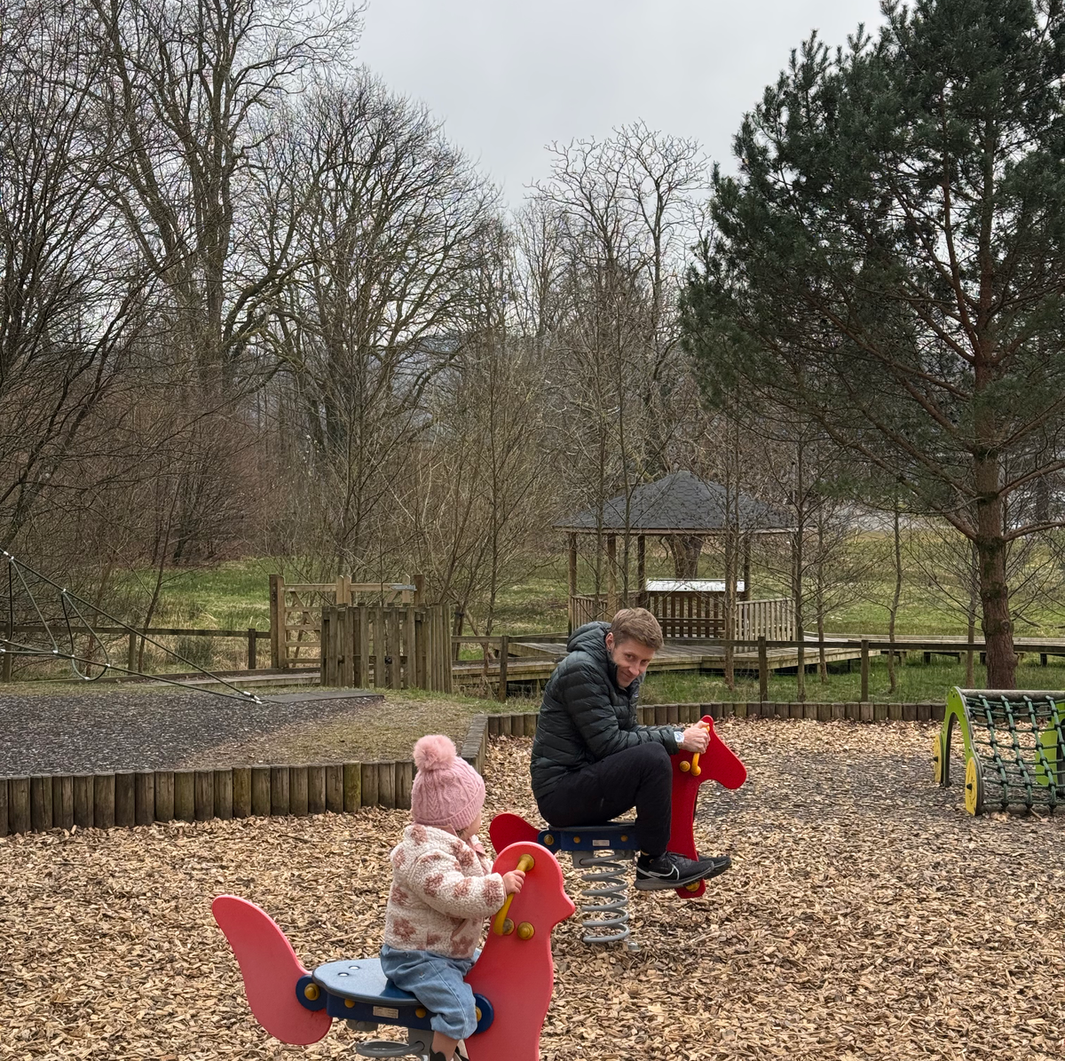 baby and dad on ride