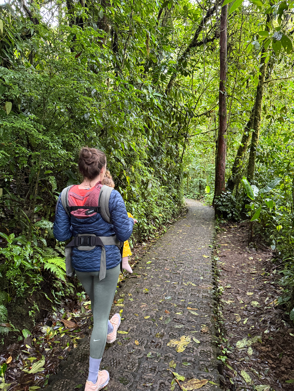 BEST THINGS TO DO IN MONTEVERDE Woman carrying baby in forest
