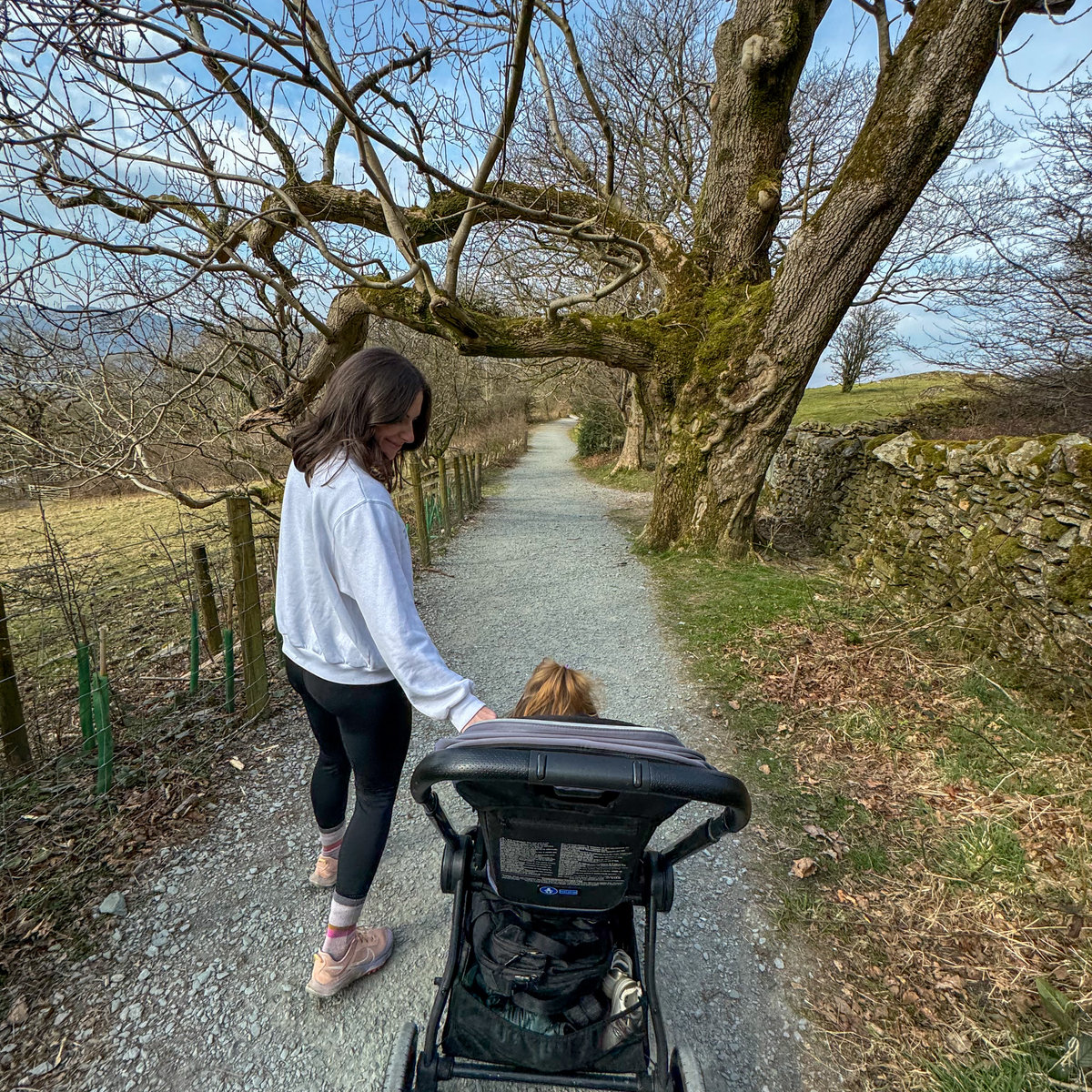 woman and baby in pram